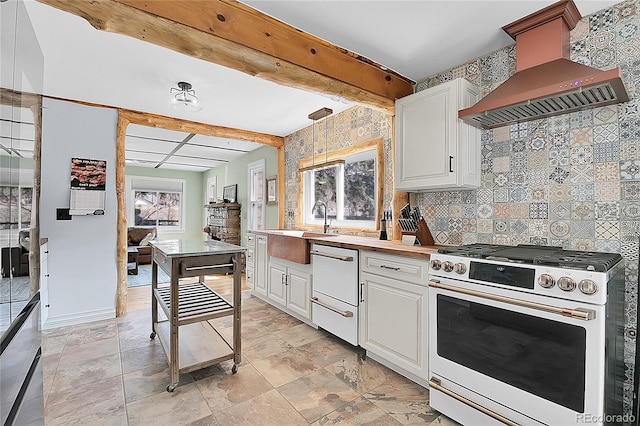 124 River Dr, Bailey, CO 80421 - kitchen featuring range with gas stovetop, custom exhaust hood, dishwasher, decorative backsplash, and a sink