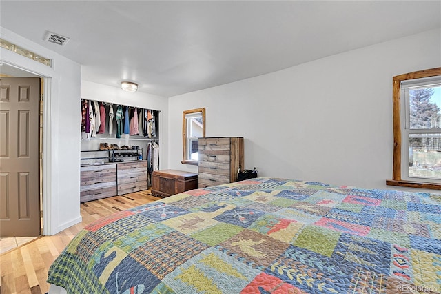124 River Dr, Bailey, CO 80421 - bedroom featuring light wood finished floors
