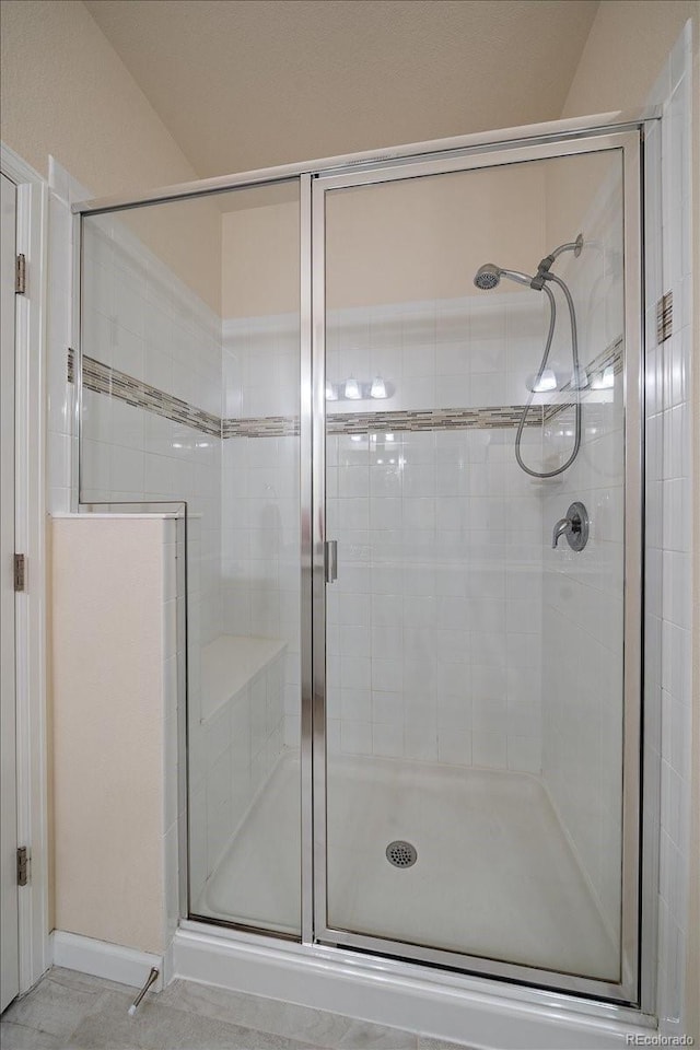 bathroom featuring walk in shower