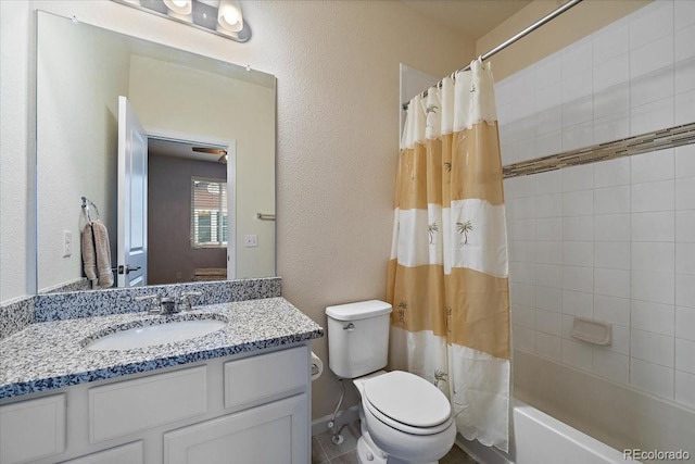 full bathroom with vanity, shower / bath combination with curtain, and toilet