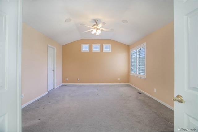 2608 S Troy Ct, Aurora, CO 80014 - carpeted empty room featuring ceiling fan, lofted ceiling, and baseboards
