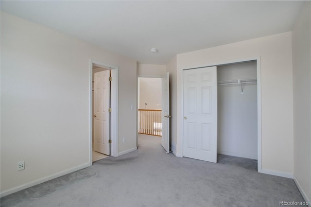 2608 S Troy Ct, Aurora, CO 80014 - unfurnished bedroom featuring carpet floors, baseboards, and a closet