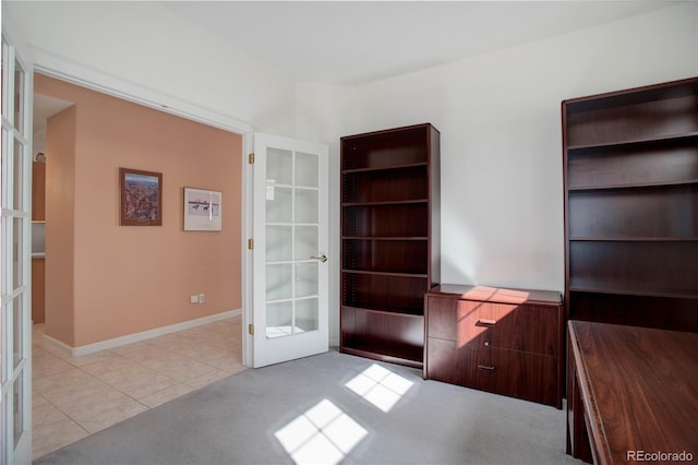 2608 S Troy Ct, Aurora, CO 80014 - unfurnished office featuring french doors and light tile patterned floors