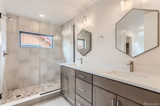 1103 Lupine Ln, Tabernash, CO 80478 - full bath featuring double vanity, a sink, and tiled shower