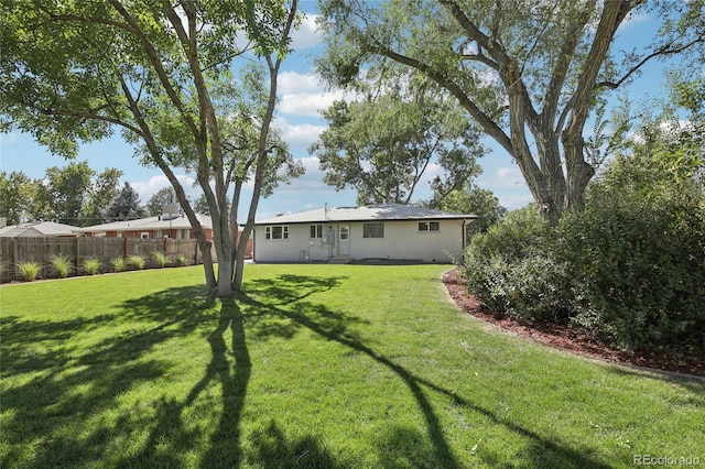 view of yard with fence