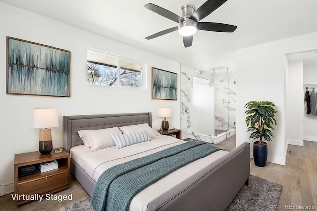 bedroom featuring a ceiling fan and wood finished floors