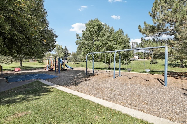 community play area with a lawn