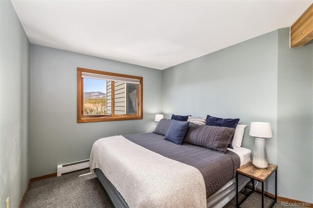 9430 Ryan Gulch Rd Unit 9450, Silverthorne, CO 80498 - carpeted bedroom featuring baseboard heating and baseboards