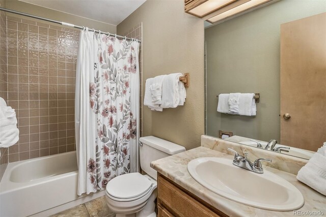 9430 Ryan Gulch Rd Unit 9450, Silverthorne, CO 80498 - bathroom with toilet, vanity, and shower / tub combo with curtain