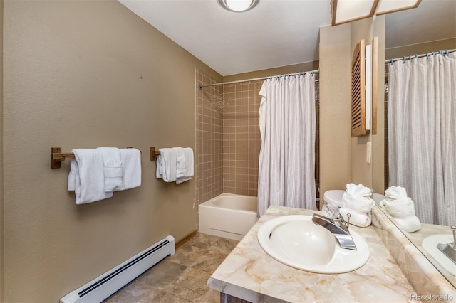 9430 Ryan Gulch Rd Unit 9450, Silverthorne, CO 80498 - full bath with a baseboard heating unit, vanity, shower / bath combo, and baseboards
