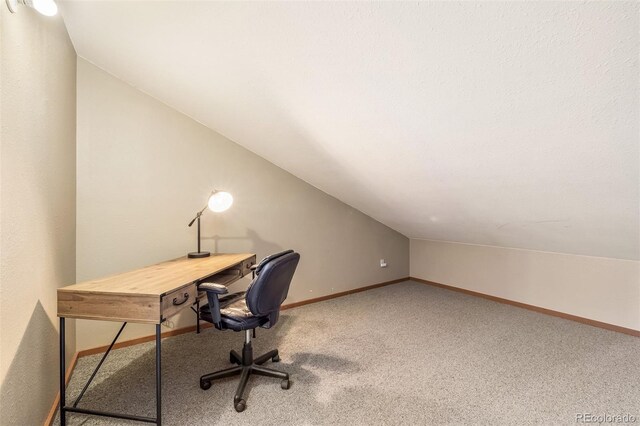 9430 Ryan Gulch Rd Unit 9450, Silverthorne, CO 80498 - carpeted home office featuring lofted ceiling and baseboards