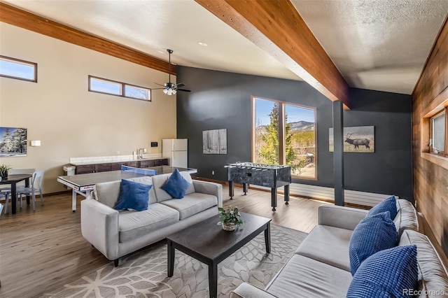 9430 Ryan Gulch Rd Unit 9450, Silverthorne, CO 80498 - living room with wood finished floors, a ceiling fan, and baseboards