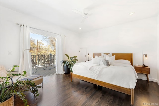 bedroom featuring dark hardwood / wood-style flooring, access to outside, and ceiling fan