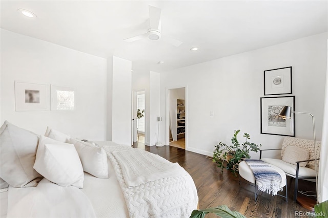 bedroom featuring dark hardwood / wood-style flooring and ceiling fan