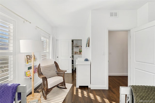 living area with dark wood-type flooring