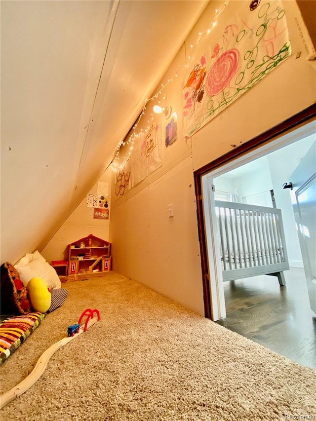 game room featuring vaulted ceiling