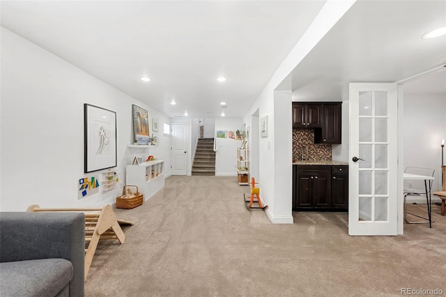 playroom with light carpet