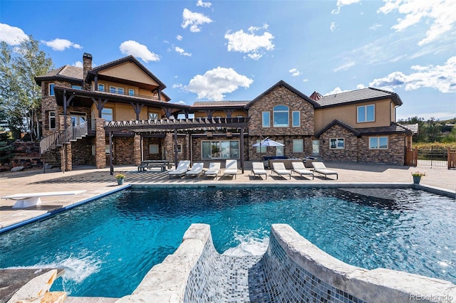 view of pool with a pergola and a patio area