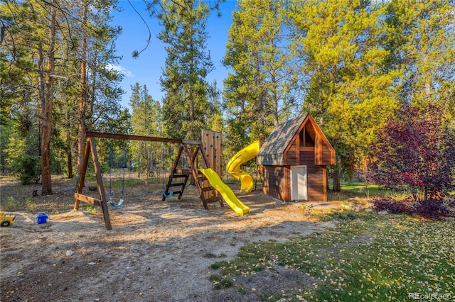 view of jungle gym with a shed