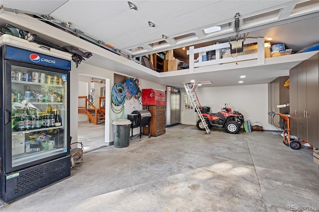 garage featuring black fridge