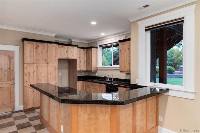 kitchen featuring light brown cabinetry, dishwasher, sink, kitchen peninsula, and crown molding