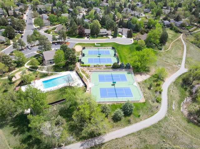 aerial view of property's location featuring a pool