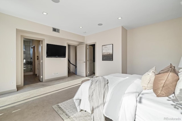 3615 Navajo St, Denver, CO 80211 - bedroom featuring light carpet, baseboards, recessed lighting, and ensuite bathroom