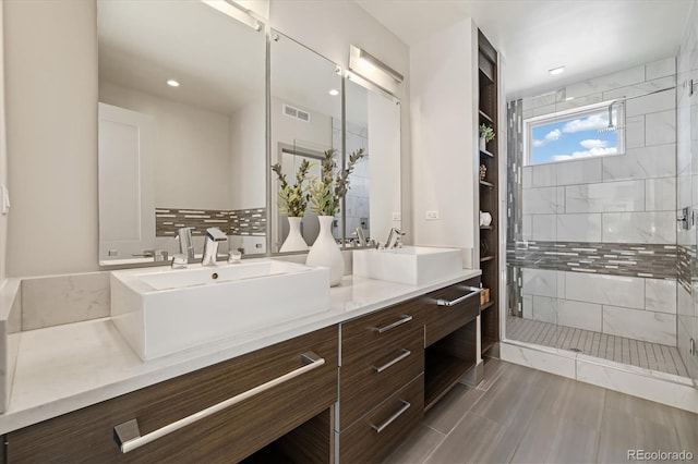 3615 Navajo St, Denver, CO 80211 - bathroom with double vanity, a stall shower, and recessed lighting