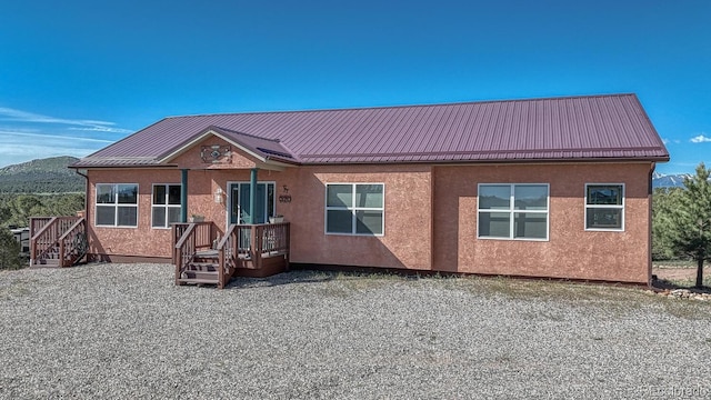 2680 Wild Bill Blvd, Westcliffe, CO 81252 - view of front of house featuring stucco siding and a metal roof