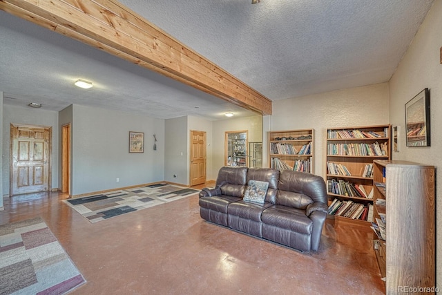 2680 Wild Bill Blvd, Westcliffe, CO 81252 - living room featuring a textured ceiling and concrete floors