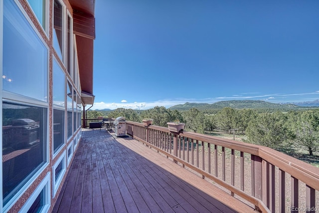 2680 Wild Bill Blvd, Westcliffe, CO 81252 - wooden deck featuring a mountain view and a forest view