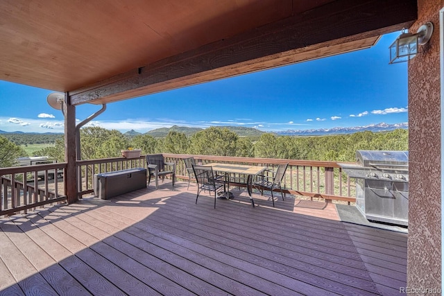 2680 Wild Bill Blvd, Westcliffe, CO 81252 - deck with a mountain view and outdoor dining space