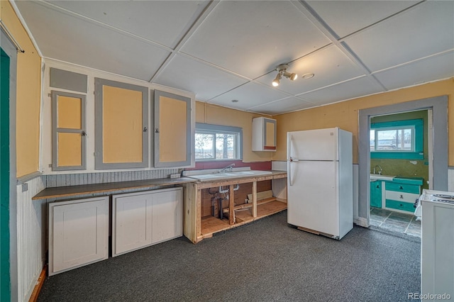 kitchen with sink and white appliances