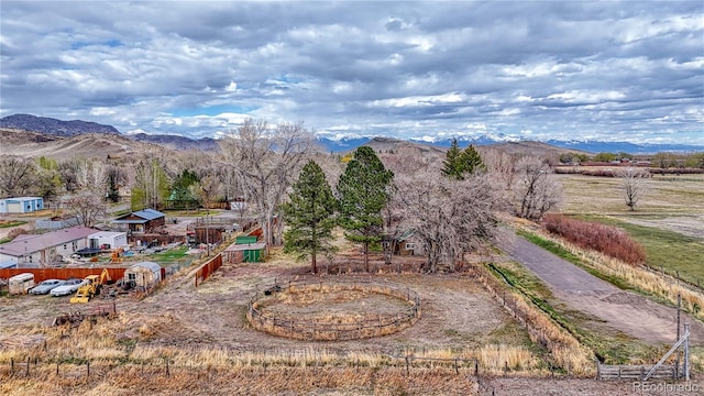 view of mountain feature with a rural view