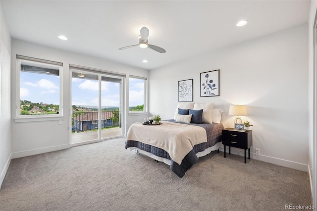 260 Upper Glenway Rd, Palmer Lake, CO 80133 - carpeted bedroom featuring access to outside, multiple windows, recessed lighting, and a ceiling fan