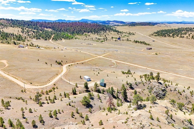 165 Coyotero Trl, Hartsel, CO 80449 - aerial view of sparsely populated area with a mountain backdrop