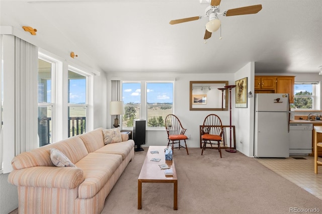 165 Coyotero Trl, Hartsel, CO 80449 - living area with light carpet, a ceiling fan, and lofted ceiling