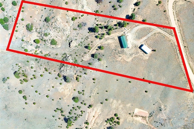165 Coyotero Trl, Hartsel, CO 80449 - aerial view of sparsely populated area with a desert landscape and property parcel outlined