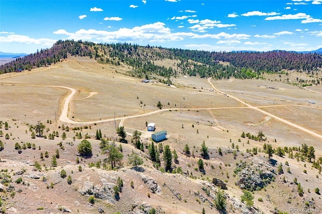 165 Coyotero Trl, Hartsel, CO 80449 - view of rural area featuring mountains and a desert landscape