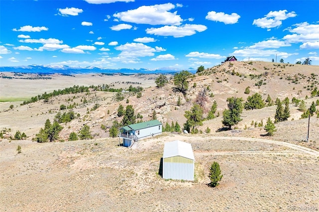 165 Coyotero Trl, Hartsel, CO 80449 - view of mountain backdrop with a desert landscape and rural landscape