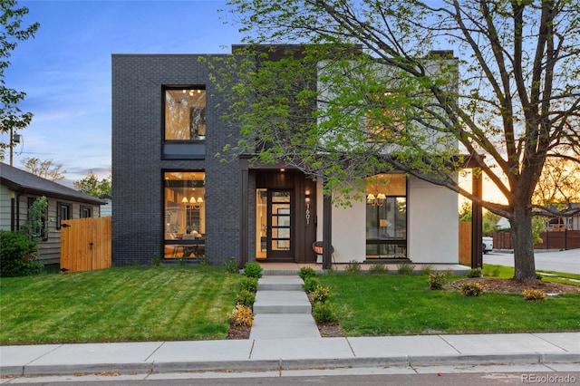 1601 S Columbine St, Denver, CO 80210 - contemporary home featuring brick siding and a gate