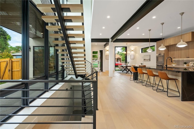 1601 S Columbine St, Denver, CO 80210 - stairway with wood finished floors and recessed lighting