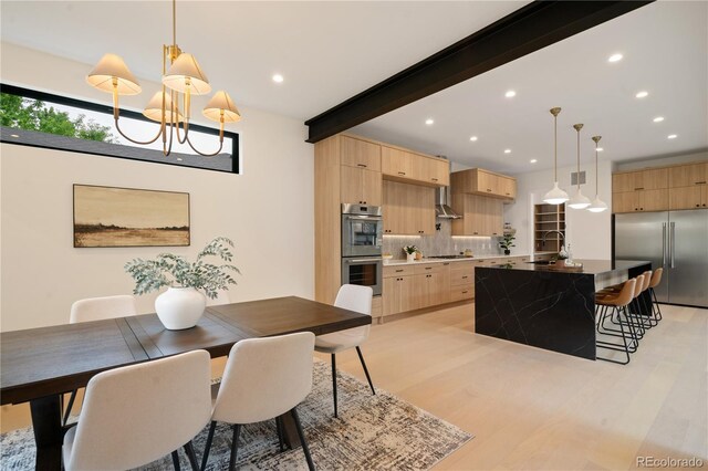 1601 S Columbine St, Denver, CO 80210 - dining room with light wood finished floors, recessed lighting, beamed ceiling, and a chandelier