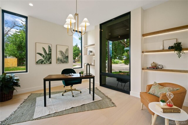 1601 S Columbine St, Denver, CO 80210 - home office with wood finished floors, baseboards, a chandelier, recessed lighting, and a wall of windows