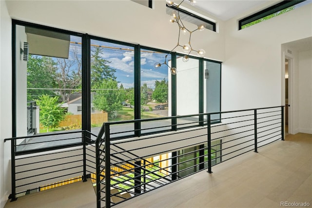 1601 S Columbine St, Denver, CO 80210 - hall with a chandelier, plenty of natural light, and an upstairs landing