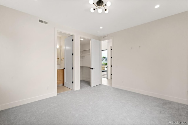 1601 S Columbine St, Denver, CO 80210 - unfurnished bedroom featuring carpet floors, baseboards, a spacious closet, recessed lighting, and a closet