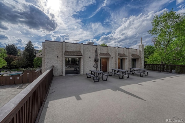 rear view of house featuring a patio area