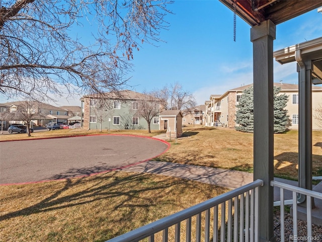 view of yard featuring a residential view