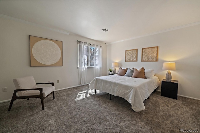 carpeted bedroom with visible vents, baseboards, and crown molding