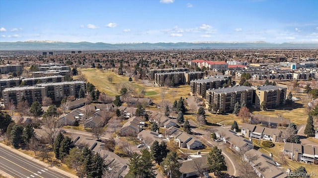 birds eye view of property featuring a mountain view